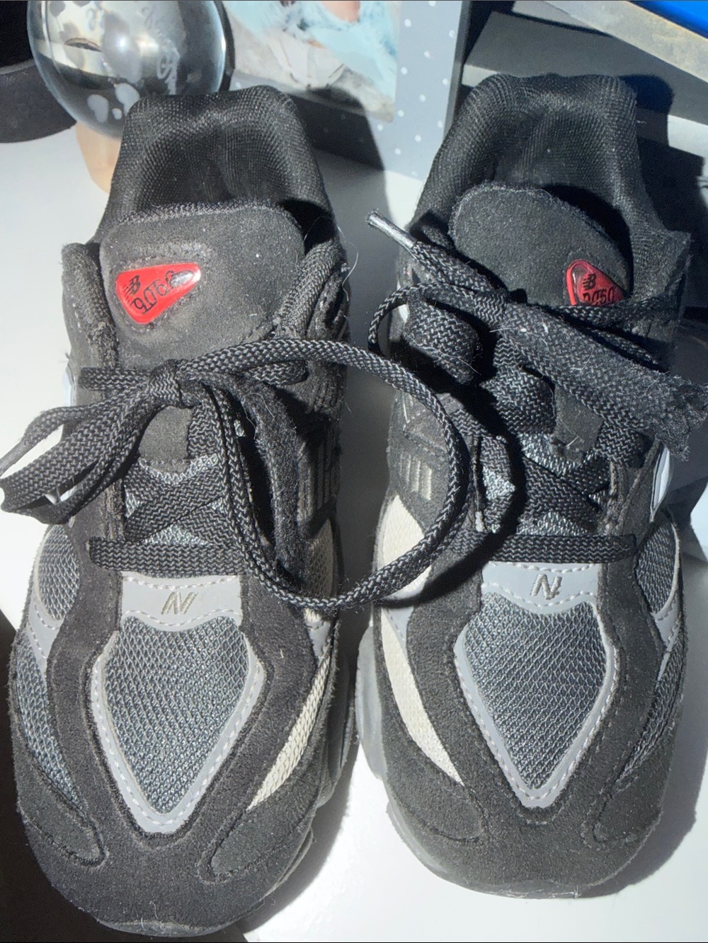 New Balance Black and Gray Lace-Up Sneakers with Red Tongue Accents